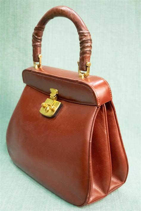 borsa vintage gucci anni 60|Borsa Gucci anni 60 – Madame Pauline Vintage.